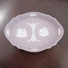 This rare Wedgwood lilac jasperware pin dish features crisp white reliefs of Aurora and the Muses watering Pegasus, a true neoclassical collectible.