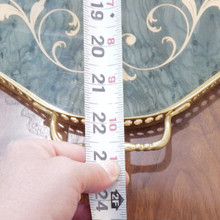 Add a touch of old-world charm with this vintage scalloped tray showcasing Italian craftsmanship and delicate inlaid flowers.