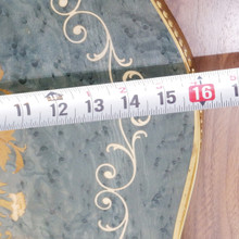 A decorative yet practical vintage tray featuring pierced brass edges and a hand-crafted marquetry floral centerpiece.