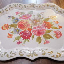 This tray is large enough to serve drinks or snacks and stylish enough to stand alone as art.