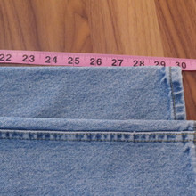 Timeless medium blue wash pairs effortlessly with any outfit.