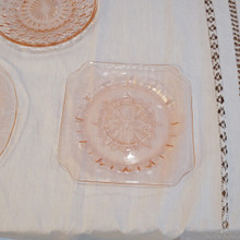 Made in soft pink glass that glows beautifully in natural light.