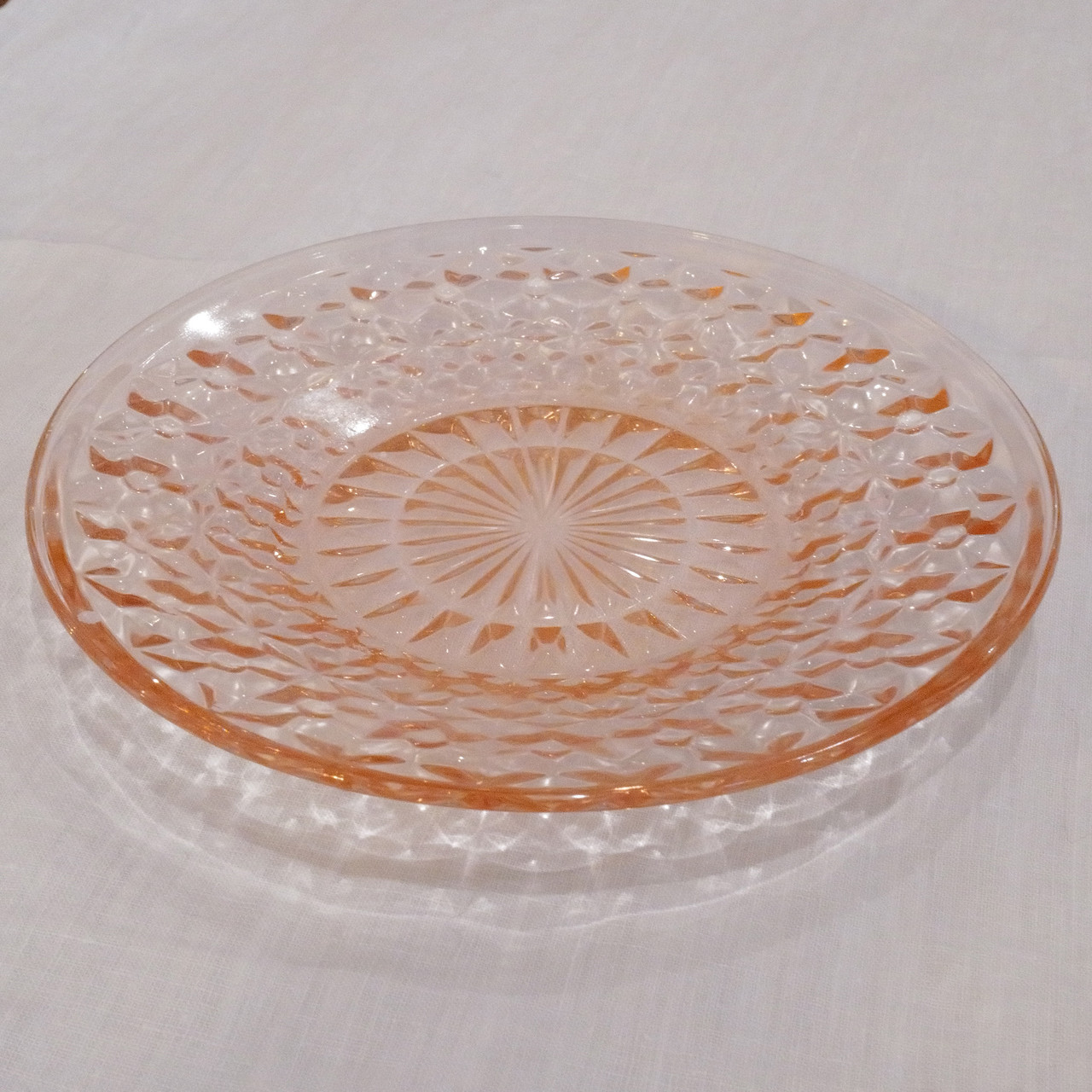Vintage Jeannette Glass saucer in the Holiday Pink pattern.  Made between 1947 and 1949 during the post-Depression era.