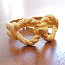 Collectible Trifari bracelet in a warm gold finish, ideal for layering.