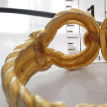 A chic hinged bangle to complement your jewelry collection.