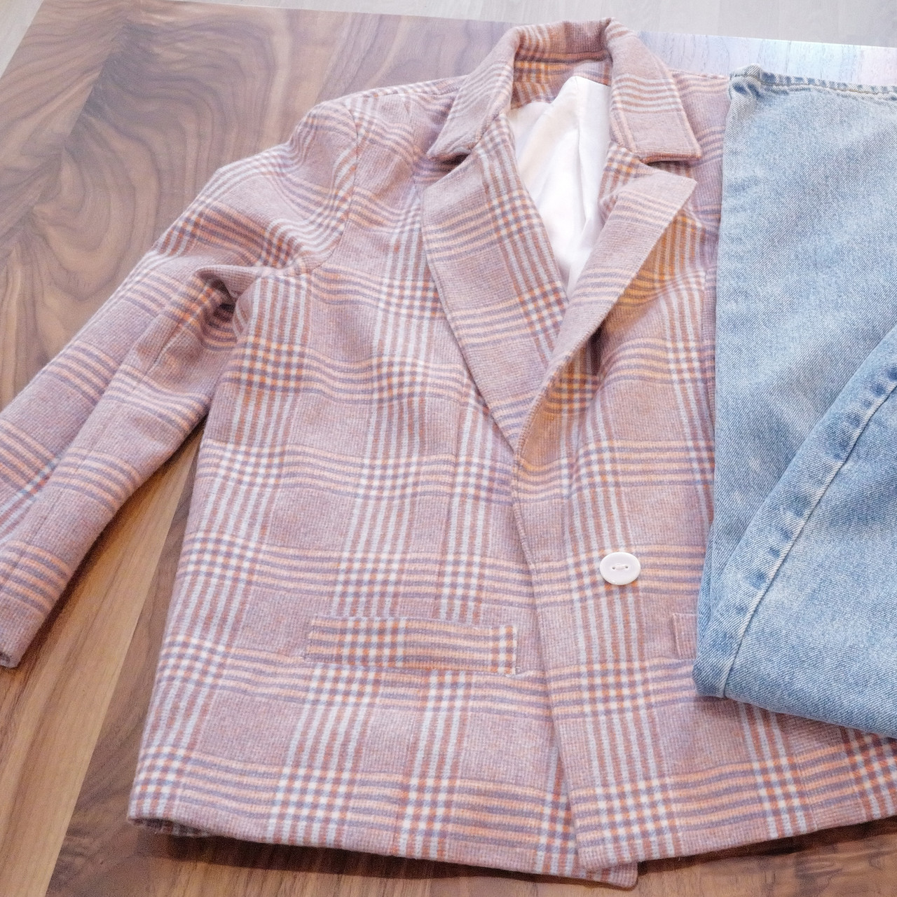 Bespoke wool plaid coat with luxurious silk lining.  Versatile styling—dress up or wear casually with jeans.