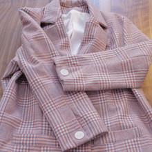 A structured cut with notched lapels for a refined silhouette.  100% wool, 100% silk lining, and ceramic buttons