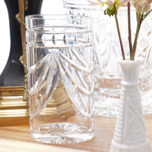 Signed Irish crystal vase with elegant starburst base.  Waterford quality ensures durability and brilliance.