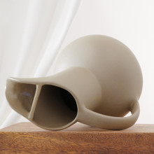 Hartstone’s mid-century stoneware pitcher pairs smooth matte glaze with a minimalist silhouette. The form is both practical for pouring and elegant for display.  Made in the USA.