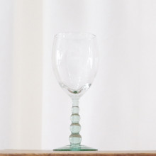 This vintage water glass is the Metropolis Spanish Green pattern made by Libbey Glass Company around 2008.