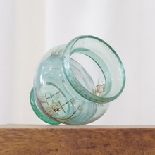 This vase is unsigned.  The scenes appear to be inspired by the work of renewed Nuremberg enameller Johann Schaper.