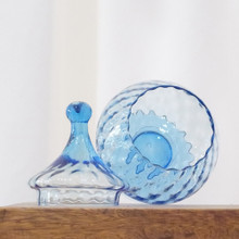 This vintage stemmed covered candy dish is a class piece of MCM collectible glass.