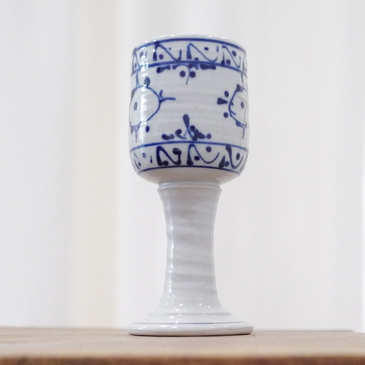 This vintage stoneware water goblet makes is a stand out piece of vintage decor.