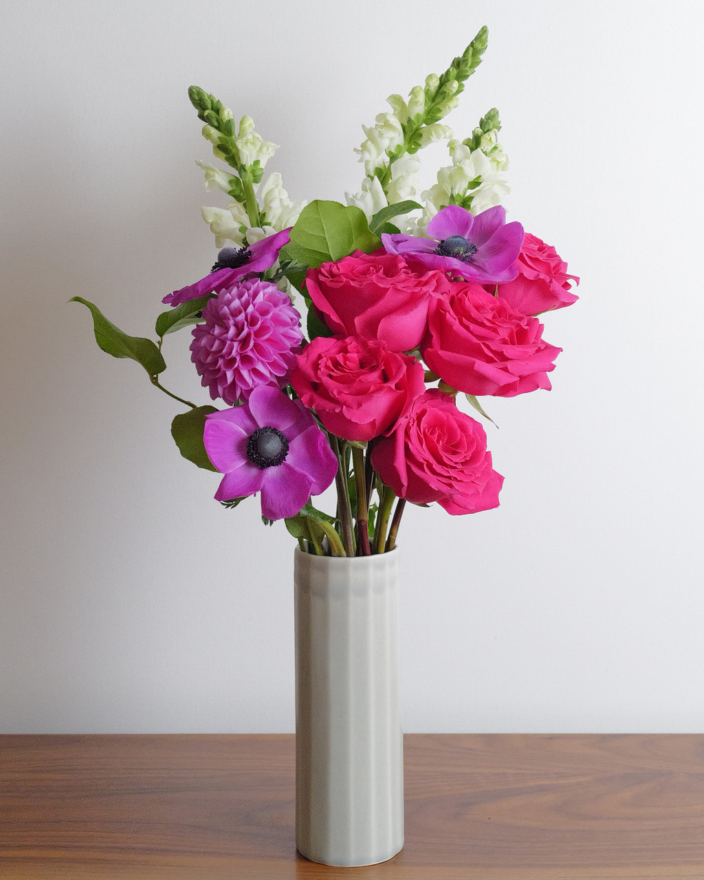 Flowers for all the vibes.  Fresh flower bouquet of high end stems in deep pinks, bright purples, and touches of cream.