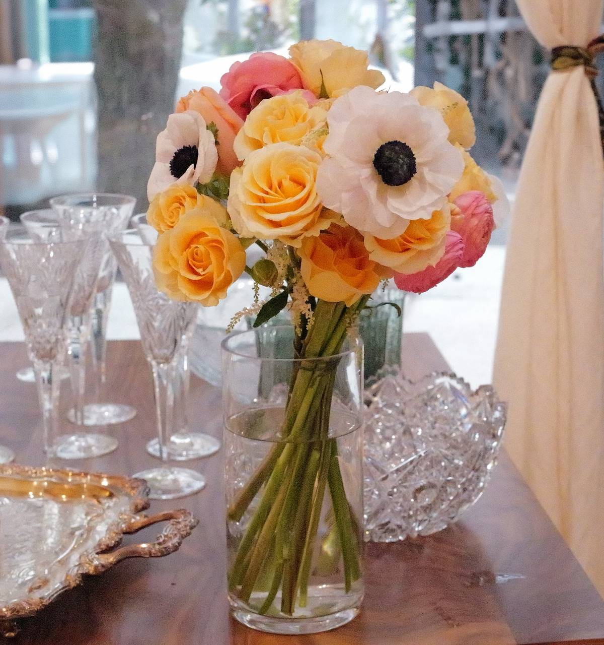 Send a bouquet of soft peaches, blushes of pink, and creamy white flowers fill this fluffy and soft bouquet of high-end stems.