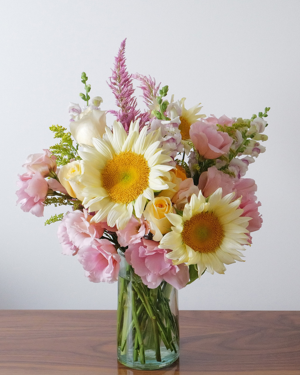 Shop Lazy Dayz, a weekly drop arrangement available for a short time, with sunflowers, soft pinks, buttery yellows and lavender accents, designed in Chicago by Flowers by Figgi.
