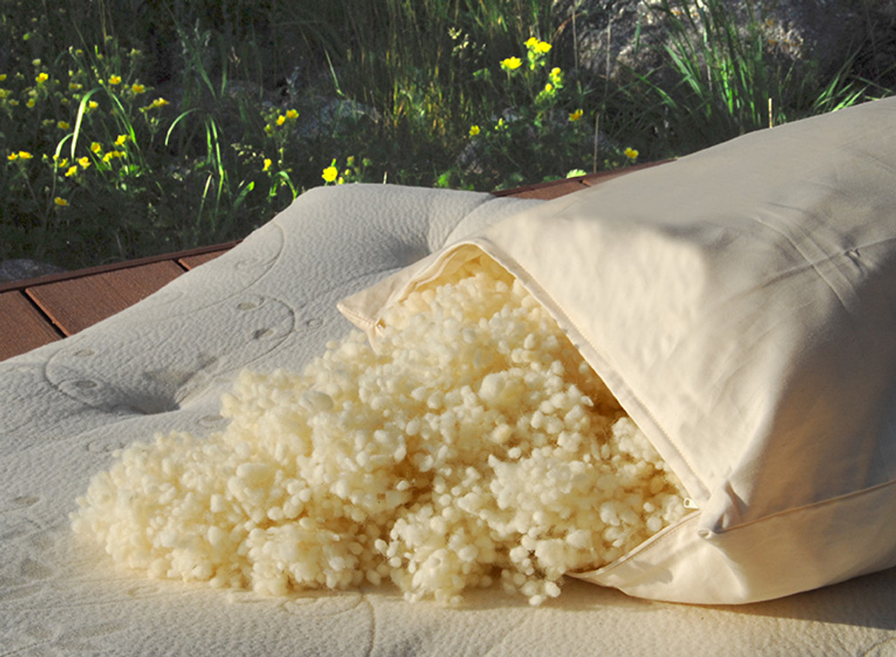 Wool Pillow filled with woolly clusters and an organic cotton zippered shell