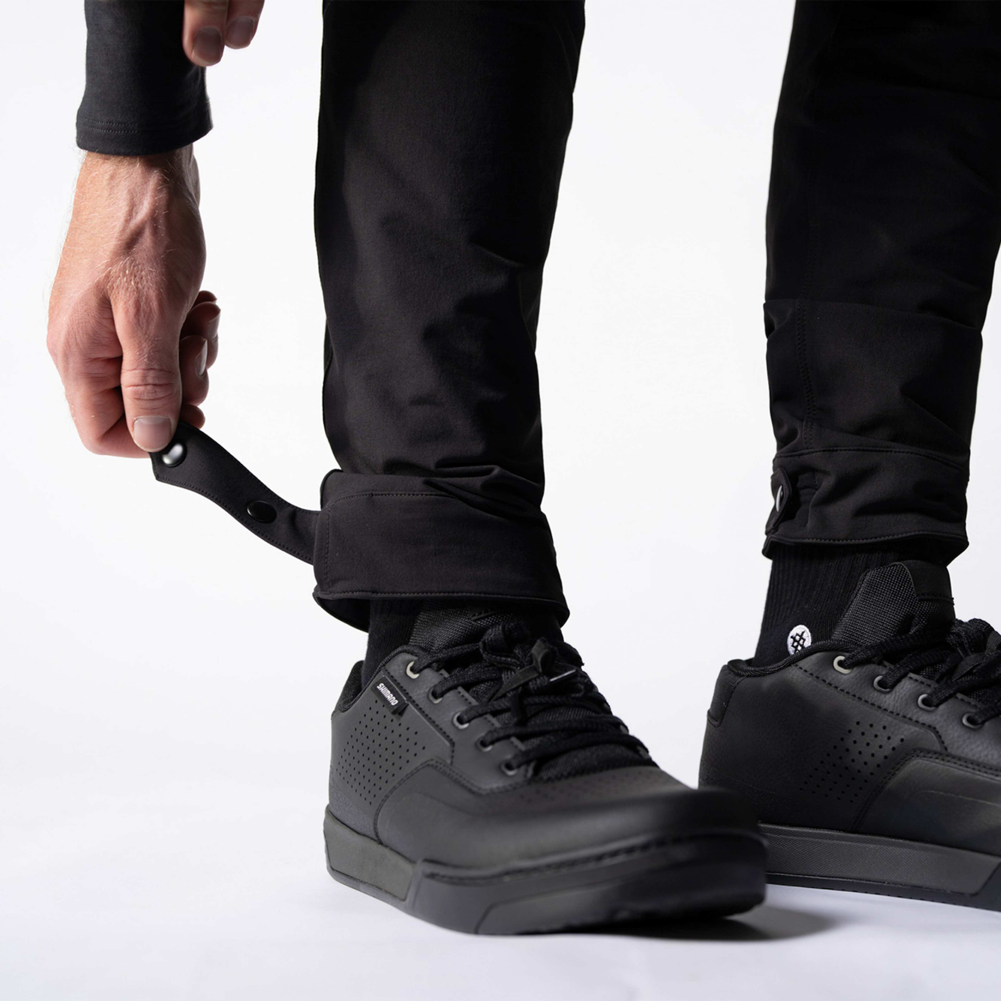 model wearing black pants in the studio