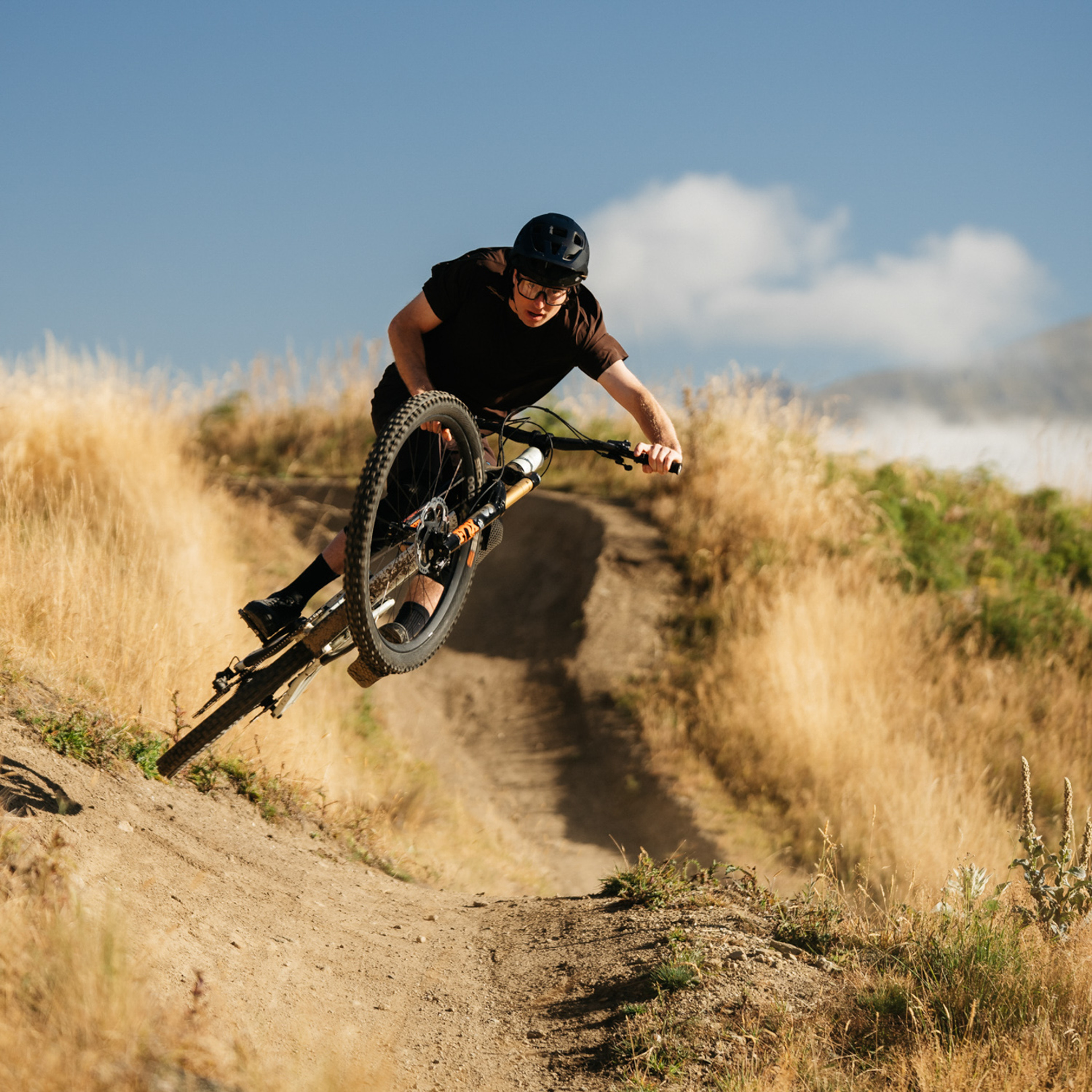 male mountain biker descending 