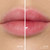 Before and after lips wearing Blooming Pink on light skin
