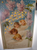 Hold To Light Postcard Christmas Cherub Angles Stars Pink Flowers HTL 1906