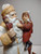 Old World Santa Claus Christmas Figurine White Long Coat Toys Child Dog Numbered