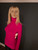 Magenta blouse with high neck and embroidered design in the center and on the sleeves.
one size