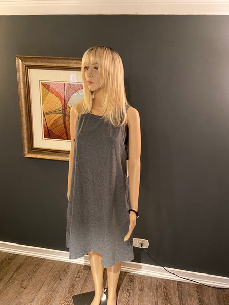 Dark gray sleeveless dress
above knee dress