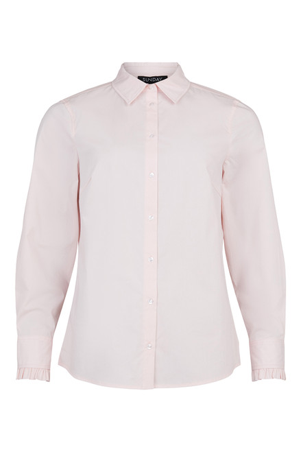 A classic shirt but with a modern frill ending at the cuff, very tasteful.
Fits well under a slipover/vest/sweater where the armholes/ruffle can be seen.
Cotton & elastane fabric makes it comfortable and easy to wear.