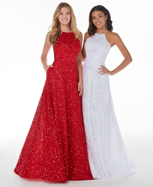 Studio 17 dress 12859. The high halter neckline a line dress has a fitted bodice that is adorn in sparkling sequins beadwork material. The back have a lace up to give you that snug fit and the a line skirt continues those rich sparkling sequins all the way down to the hem line.