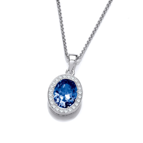 This vintage style sterling silver pendant has a wonderful elegance and remind us of past eras. Oval in design, it has a micro-set clear cubic zirconia border around a sparkling central sapphire blue cubic zirconia solitaire.