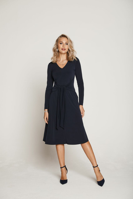 Tia Long Sleeve V Neck Dress With Tie Waist (78674. Long sleeve V neck dress with a waist tie & concealed rear zip. Perfectly lined for an ideal fit. This classic black dress will make you look and feel great.