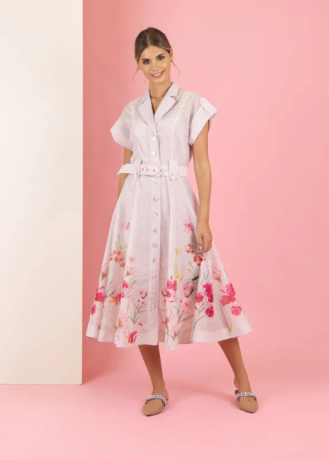 A fun shirt dress – crafted from organza with a cool floral design on the lower skirt. Short sleeves with a cute flip at the hem, shell buttons down the front, and a belt to snatch that waist – it’s playful and easygoing. Also comes with a separate vest underneath.