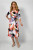 Frank Lyman Wrap Dress With Tie Belt Detail (236210)Stunning Frank Lyman multi print wrap effect dress with tie belt detail. The silky jersey knit fabric hangs beautifully with a floaty style jersey in soft pinks and blues.the dress have a flattering V neck and 3/4 length sleeves and longer lenth skirt. the dress is lined.