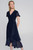 Experience effortless grace in a silky knit and chiffon flowy wrap dress. Side buckles and a sash accentuate the waist while short ruffled sleeves and a high-low hemline add playful elegance. With a below-the-knee length, this unlined marvel defines chic comfort and timeless style.