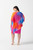 Chiffon Ombré Print Layered Poncho Dress (242207). Tailored in chiffon and a silky knit fabric, this layered poncho dress presents a unique blend of poise and bold style. This piece showcases a mesmerizing ombré print that transitions seamlessly from shade to shade. The asymmetrical poncho hem, elegantly enveloping the garment’s sheath dress, elevates every movement and adds drama to each step.