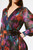 With a flowing pleated skirt, puff sleeves and an elegant wrap silhouette, this floral print chiffon midi dress will have you feeling light as air and ready to sweep into your next event. A sash belt detailed with a lovely rosette accentuates your waist, while the front slit gives a seductive feel to the look.