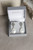 Crystal stars cluster at the top of the earring, leading into a raindrop shell. Versatile and easy to wear for any special occasion, or to add some sparkle to your day-to-day outfits.
