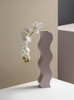 Make a splash with "Courbe" by TUTU: A beautifully crafted vase that captures the fluidity and grace of ocean waves.