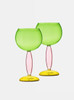 2 green and pink wine glasses