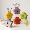 5 different coloured flower shape diffuser