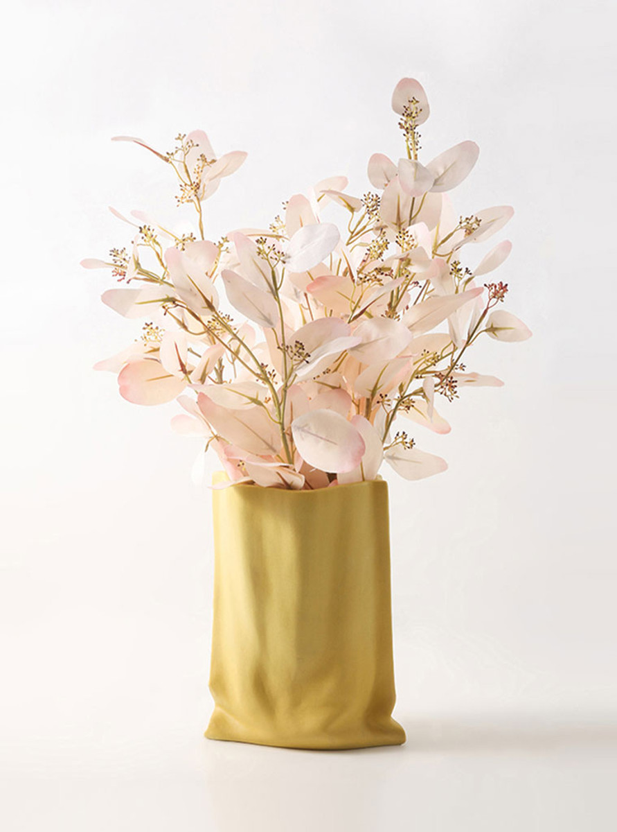 a bright yellow vase