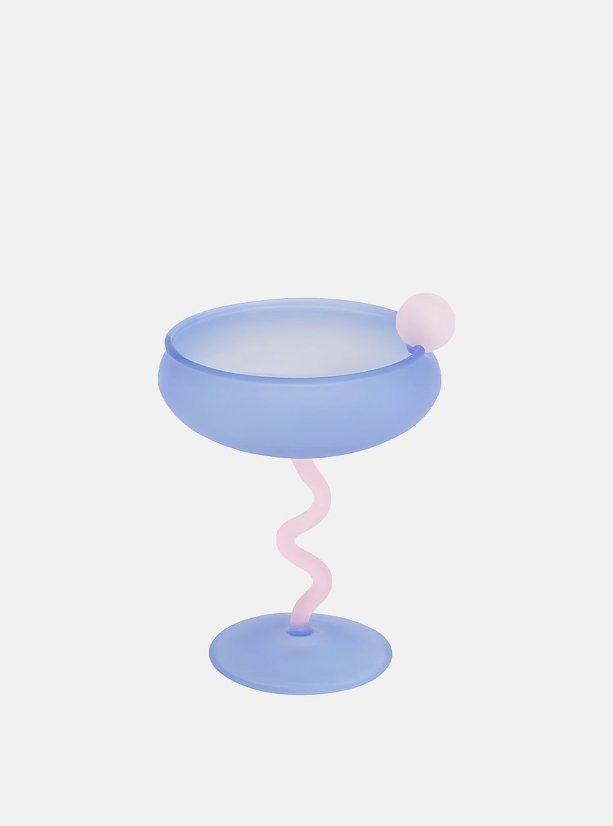 blue coupe glass with curved stem