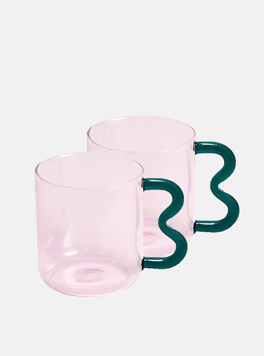 2 pink glass cups with cute curvy handle