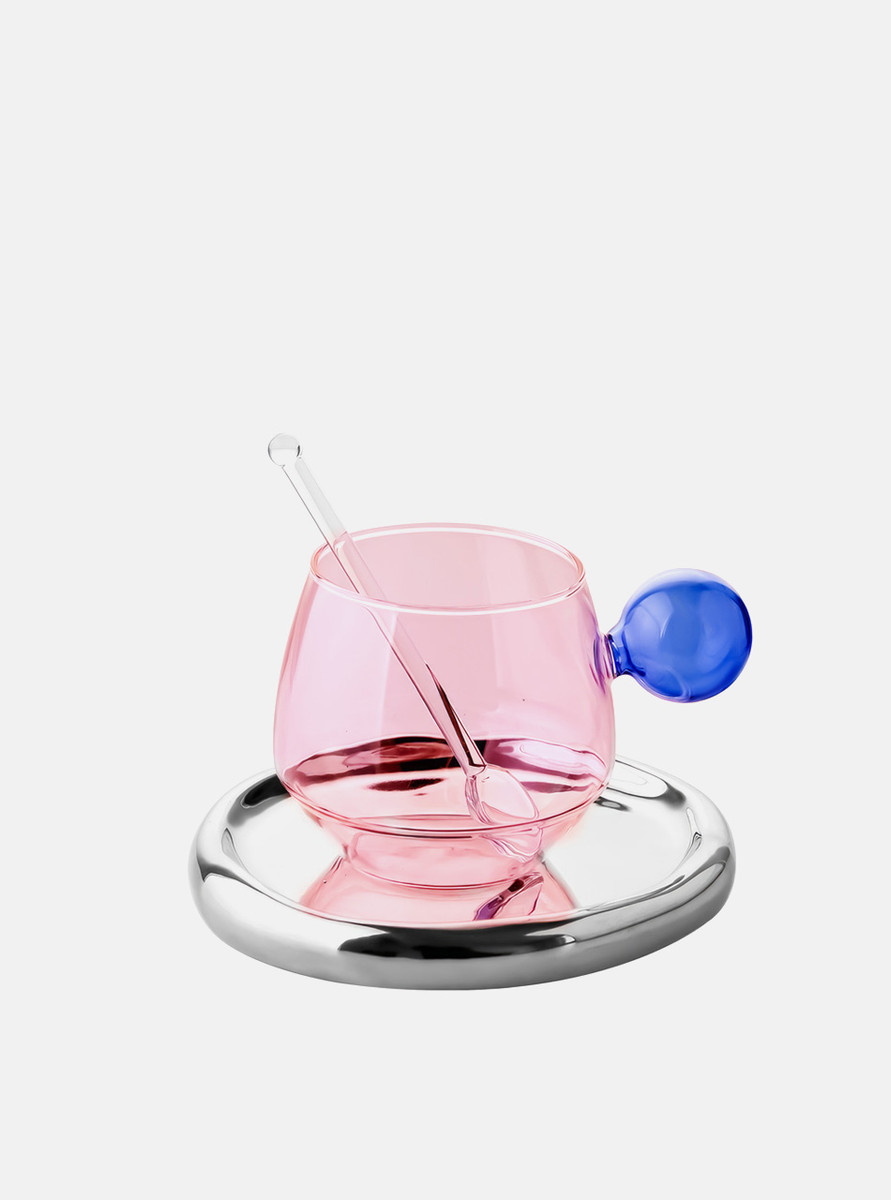 The front view of the mix-coloured pink glass cup