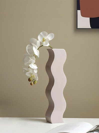 TUTU's "Courbe" vase: A wave-inspired, irregular design that blends nature and artistry.