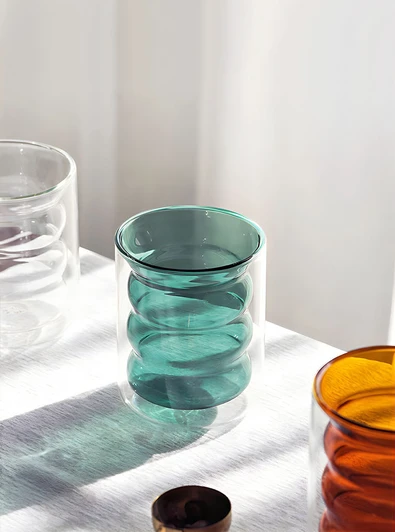 Elevate your drinking game with TUTU's "Lanterne" double-walled glass cup.