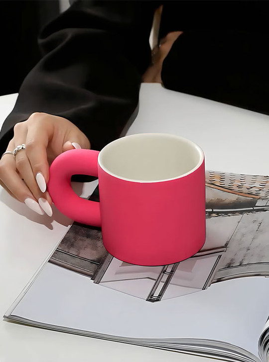 ceramic mug in hand