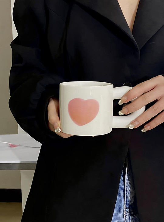 The minimalist design and expert craftsmanship of the "L'Amour" mug make it a versatile and chic gift option.