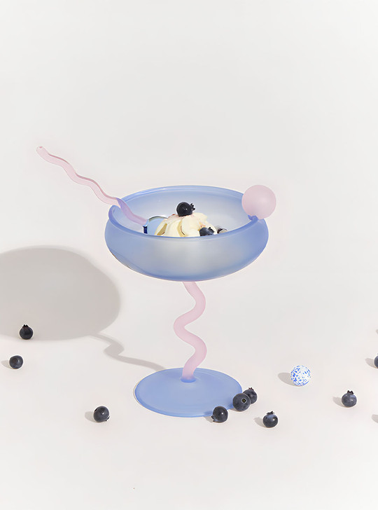 ice cream in coloured coupe dessert glass